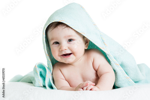 Cute happy baby in towels