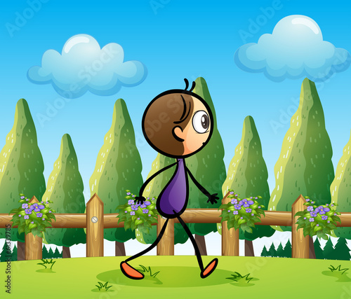 A stickman walking across the pine trees