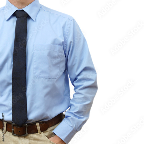 businessman in shirt with tie and jeans with hand in pocket on a