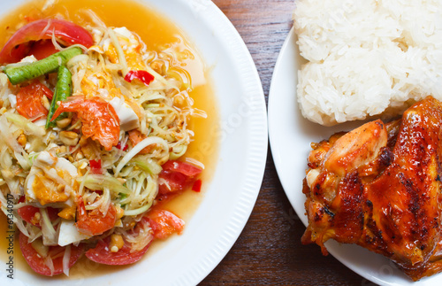 Papaya salad with grilled chicken and sticky rice , Traditional
