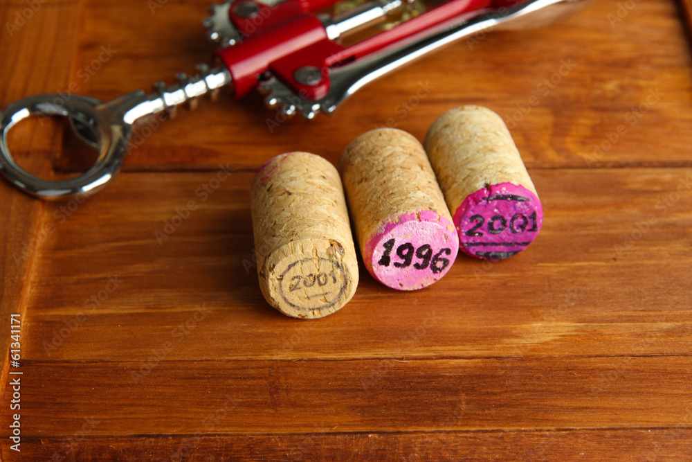 Wine corks with corkscrew on wine boxes close-up