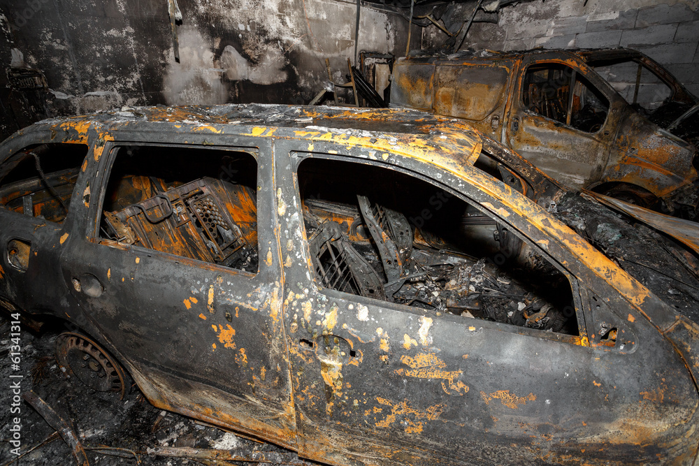 Close up photo of a burned out cars Close up photo of a burned out cars