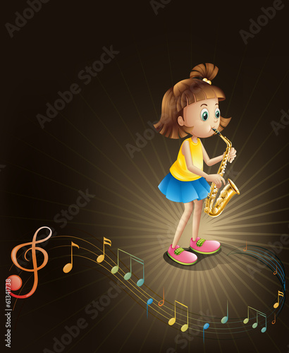A talented young girl with a saxophone