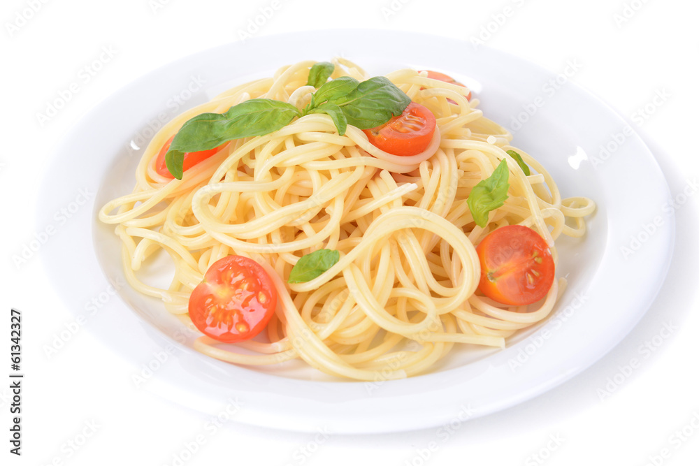 Delicious spaghetti with tomatoes on plate isolated on white Delicious spaghetti with tomatoes on plate isolated on white