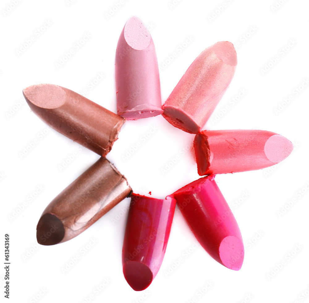 Several different lipsticks isolated on white Several different lipsticks isolated on white