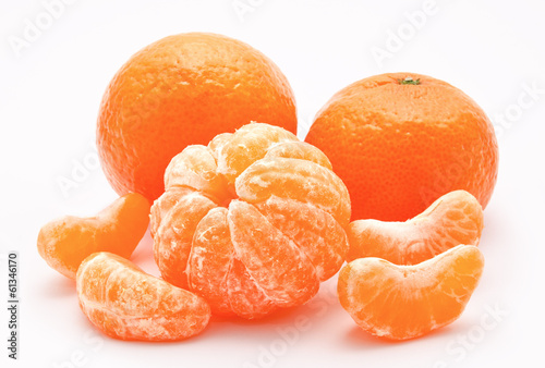 Orange tangerines isolated on a white photo