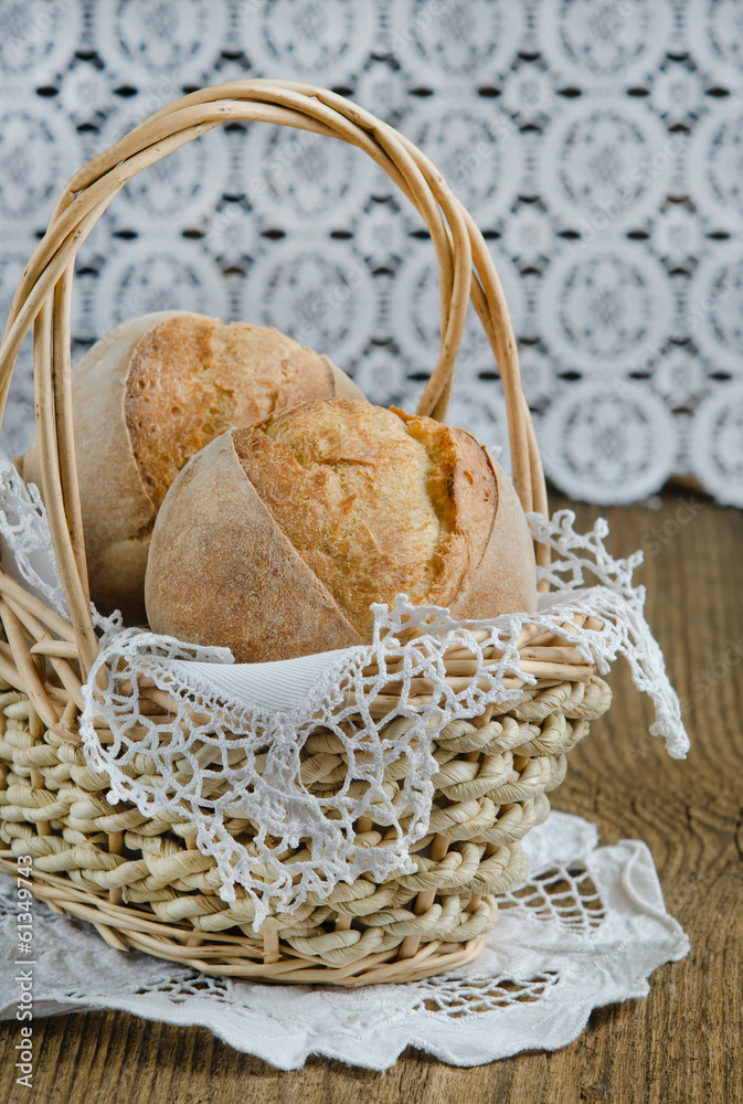 Homemade fresh buns bread in a basket Homemade fresh buns bread in a basket