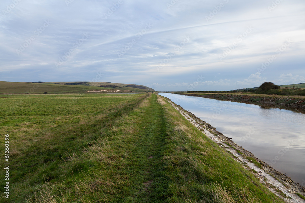 Green footpath next to Cuckmere river