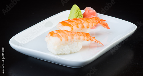 japanese cuisine. sushi shrimp on the background