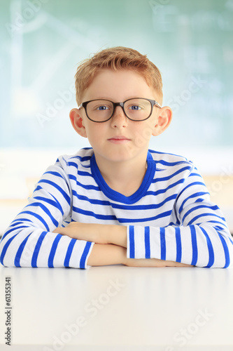 Young student sitting at desk