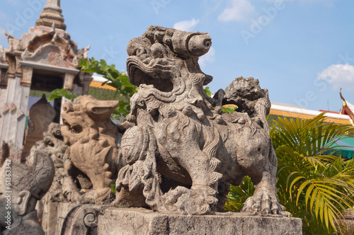 Statue at Wat Arun Temple © Elena Odareeva
