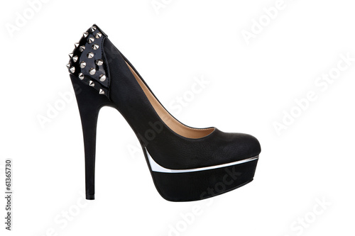 Black platform shoe with studs, isolated on white