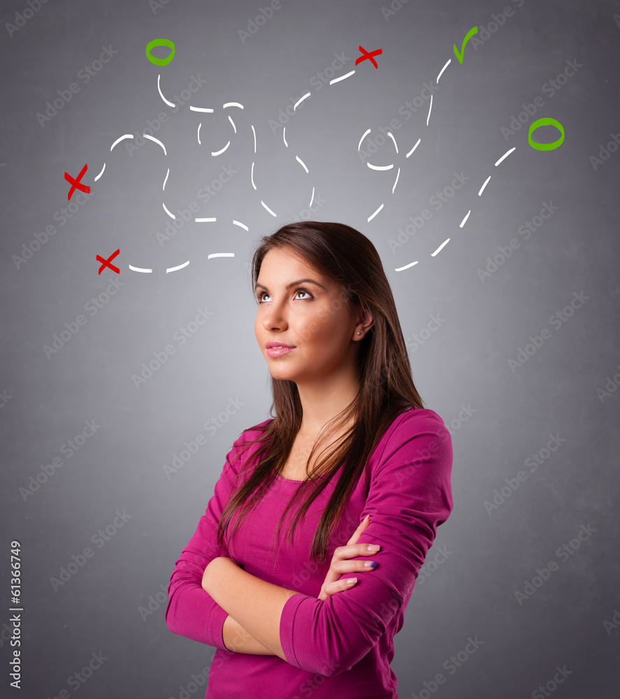 Young woman thinking with abstract marks overhead Young woman thinking with abstract marks overhead