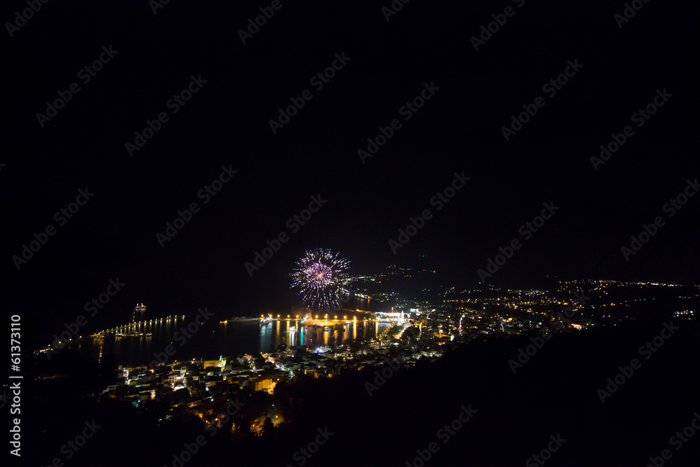fireworks in a small city at night