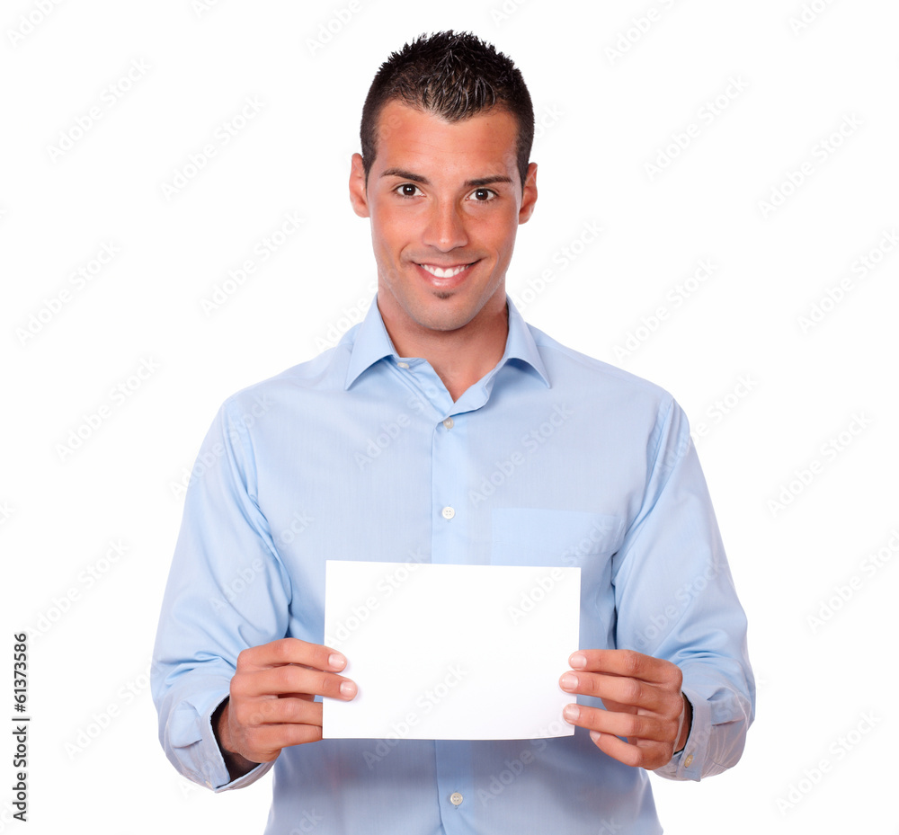 Attractive latin guy holding a white card Attractive latin guy holding a white card