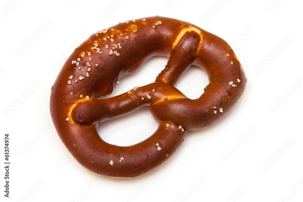 Rock salt pretzel isolated on a white studio background. Rock salt pretzel isolated on a white studio background.