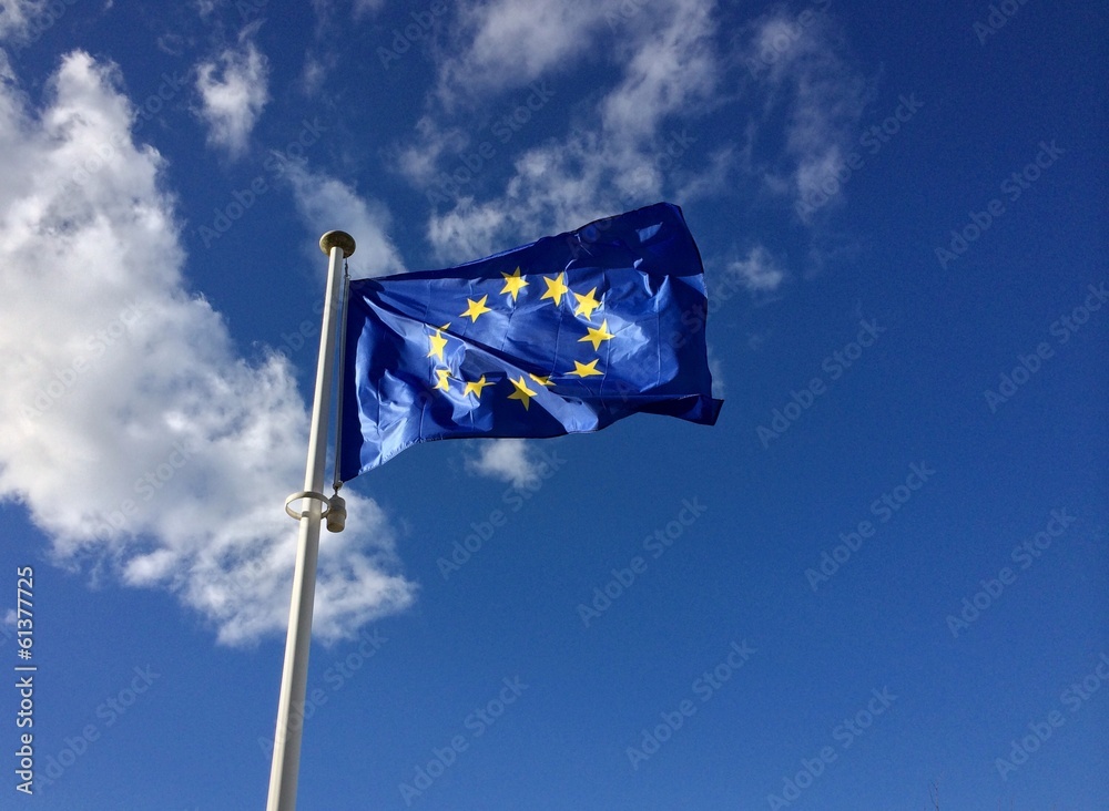 Europe flag floating over a blue sky