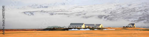 Farm house in winter on Iceland in morning twilight