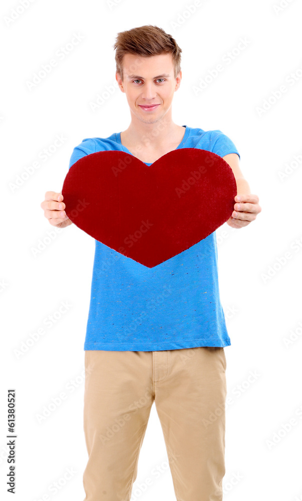 Handsome young man with big red heart, isolated on white Handsome young man with big red heart, isolated on white