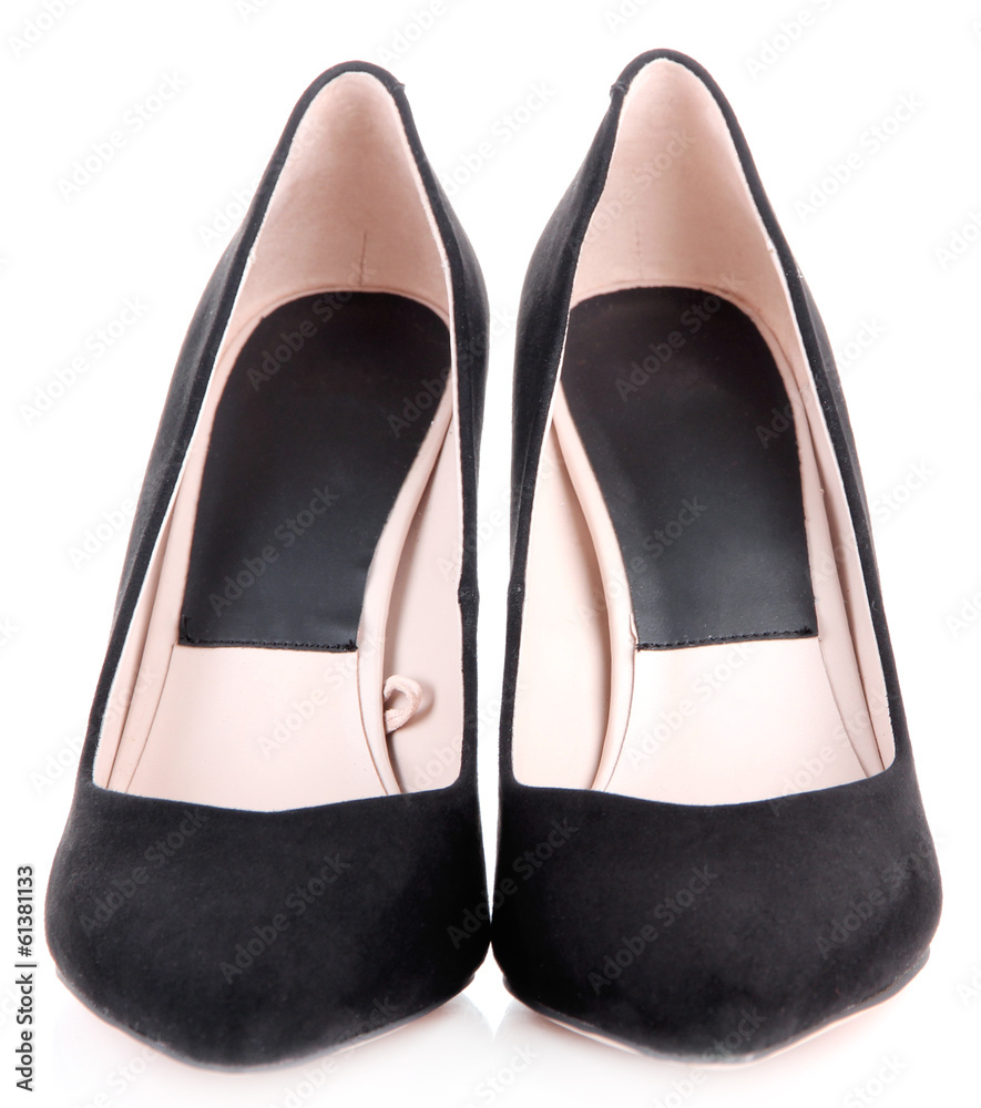 Beautiful black female shoes, isolated on white Beautiful black female shoes, isolated on white