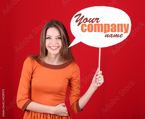 Attractive woman on red background