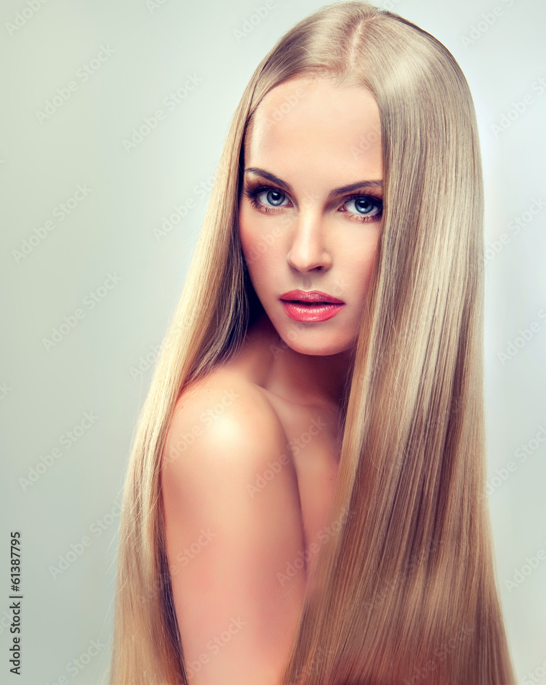Photo & Art Print Beautiful blonde woman with long, healthy and shiny hair.