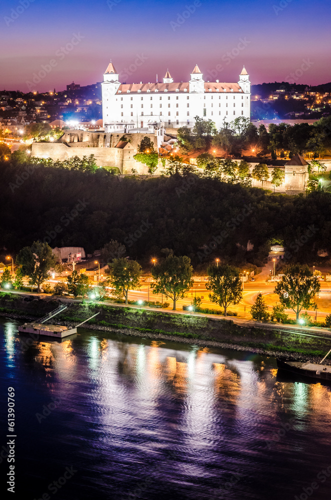 Night skyline of Bratislava with castle and Danube river