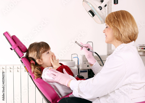 the little girl is afraid of the dentist