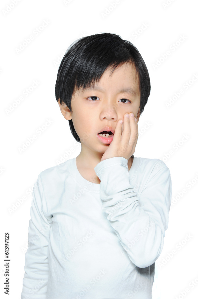 Asian boy dressed in white with tooth ache Asian boy dressed in white with tooth ache