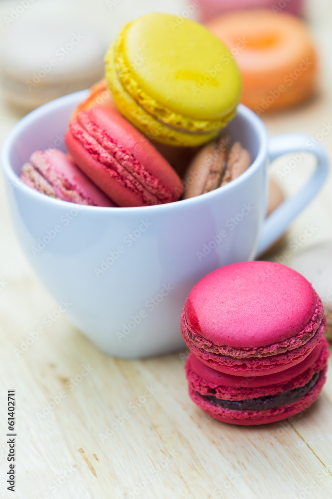Macaron in coffee cup