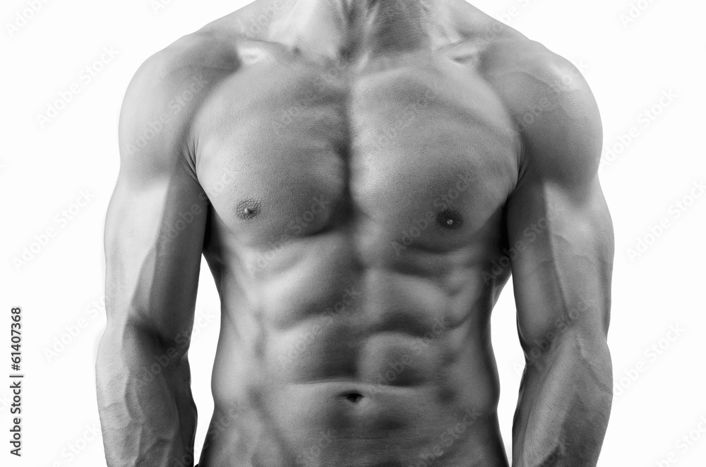 Close up on perfect abs. Strong bodybuilder with six pack Close up on perfect abs. Strong bodybuilder with six pack