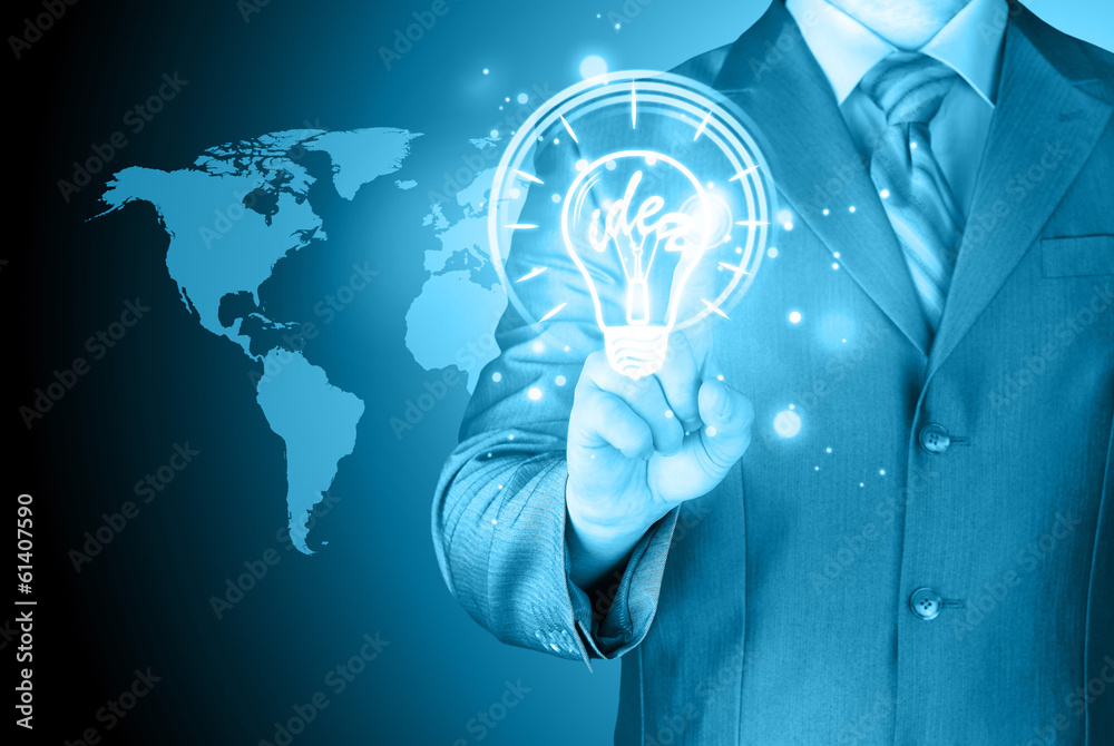 Business man touching light of idea Business man touching light of idea