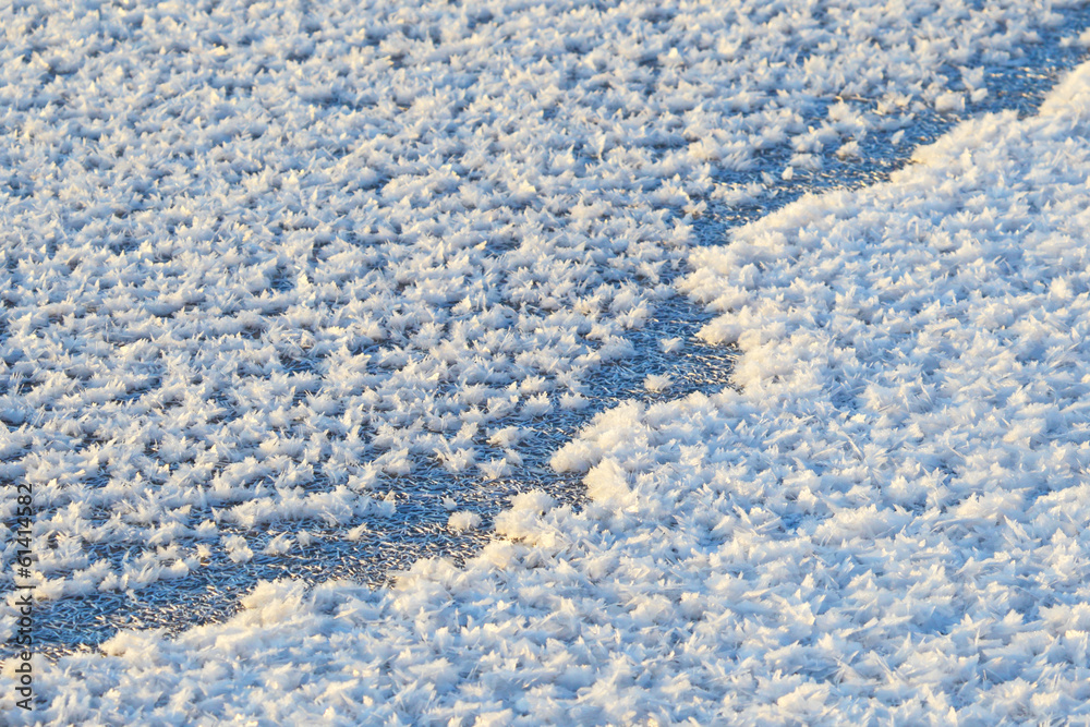 Obraz premium Crack on ice. Background and texture of snow and ice.