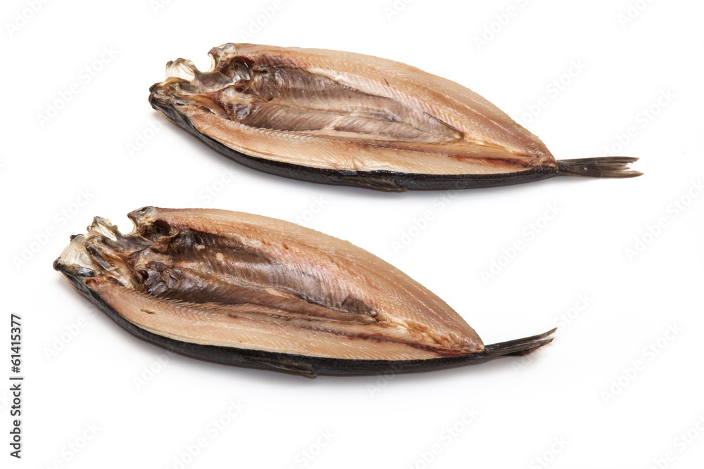 Kippers isolated on a white studio background. Kippers isolated on a white studio background.
