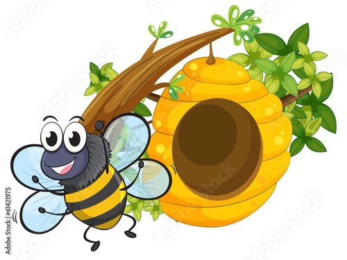 A smiling bee near the big beehive