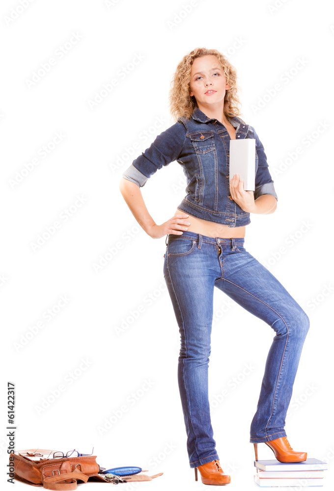 Denim fashion. Full length student girl in blue jeans bag books Denim fashion. Full length student girl in blue jeans bag books