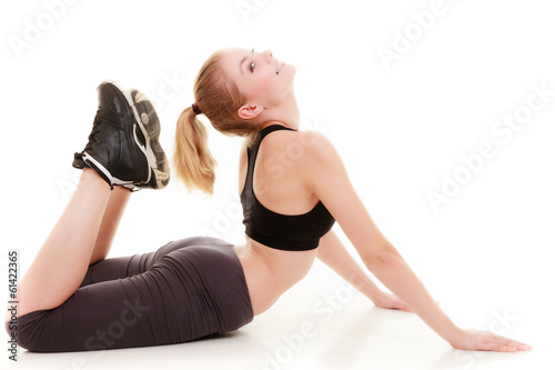 Sport girl doing stretching exercise isolated. Healthy lifestyle