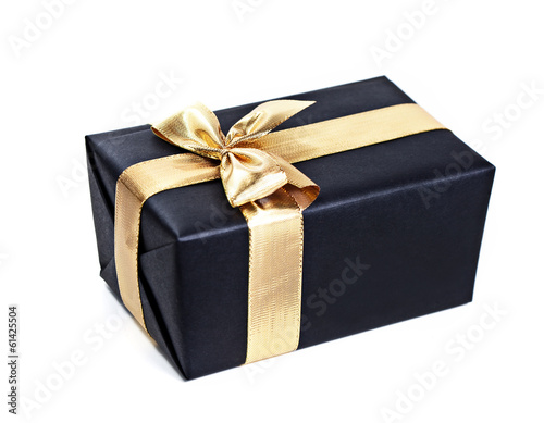 Gift with golden ribbon
