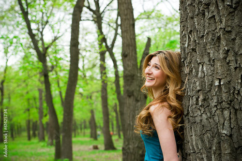 Beautiful young girl in park