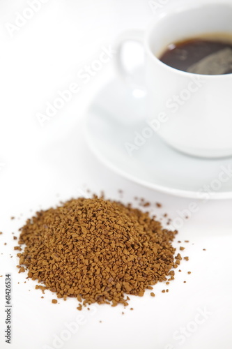 Cup with instant coffee isolated on white background