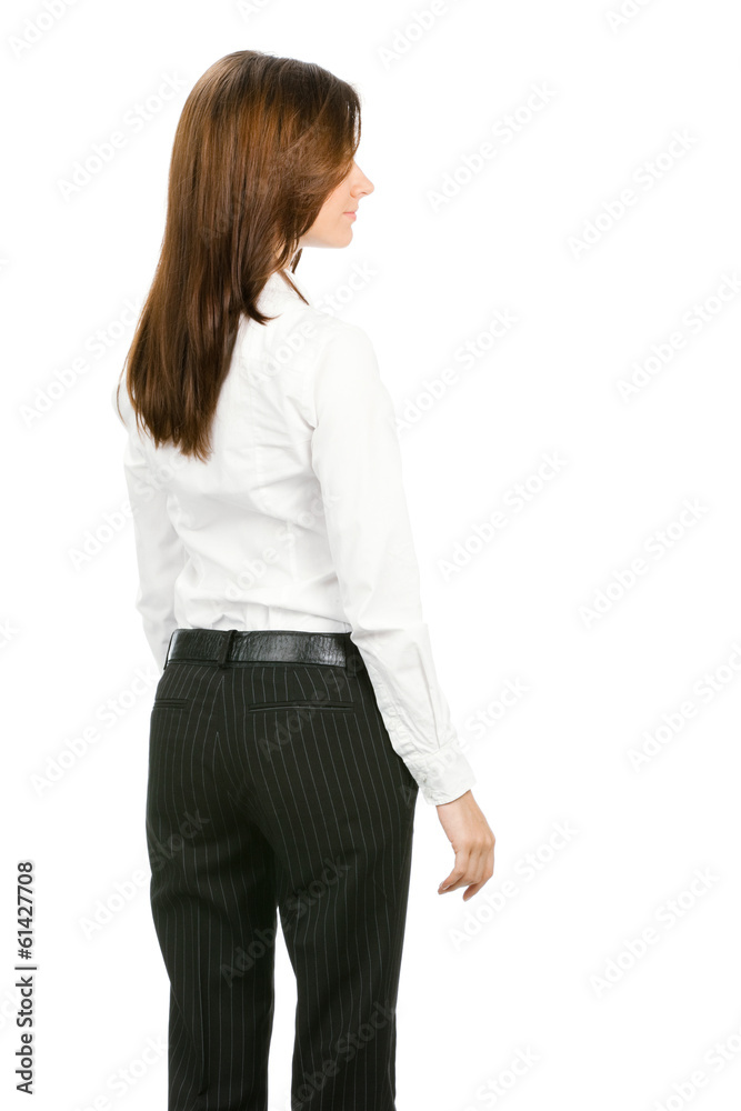 Business woman looking at something, from the back, isolated Business woman looking at something, from the back, isolated