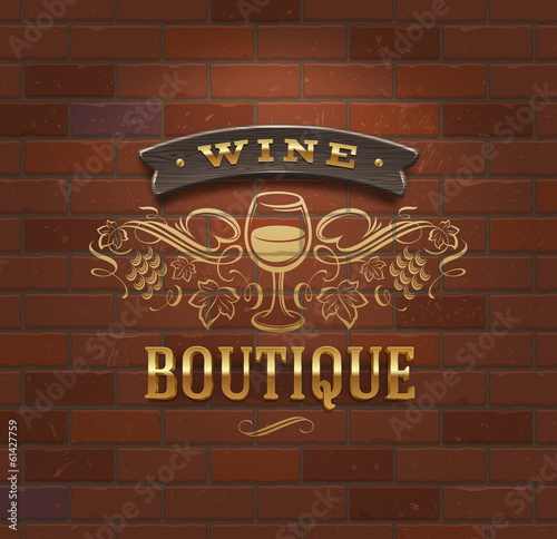 Wine boutique - vintage signboard on brick wall