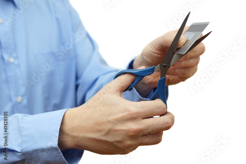 reduce your credit card debt concept with scissors and credit ca photo