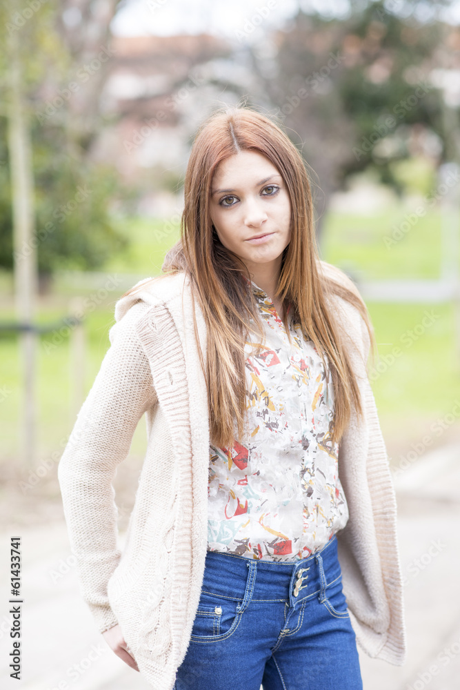 Attractive casual girl in the park. Attractive casual girl in the park.