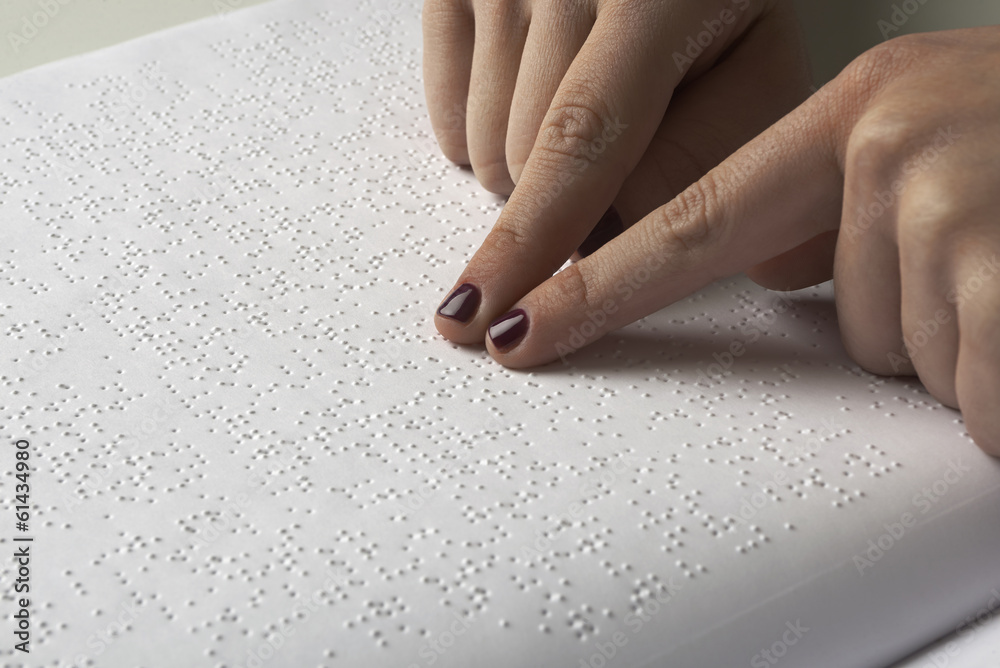 Blind reading text in braille language Blind reading text in braille language