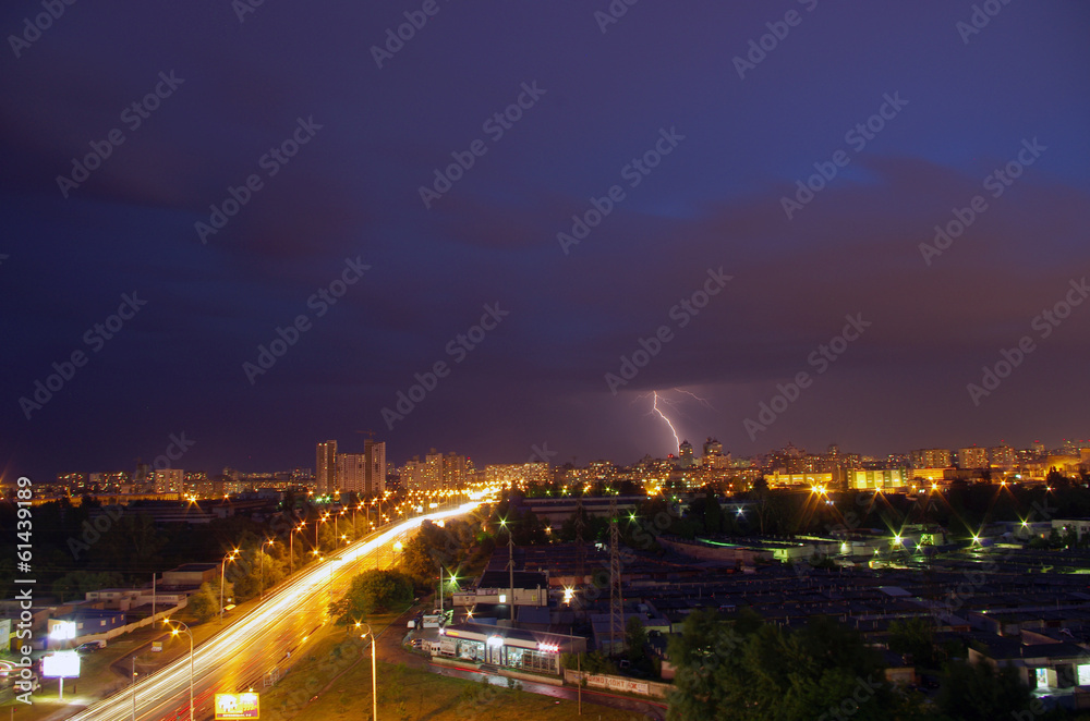 Thunderstorm with lightning in the city