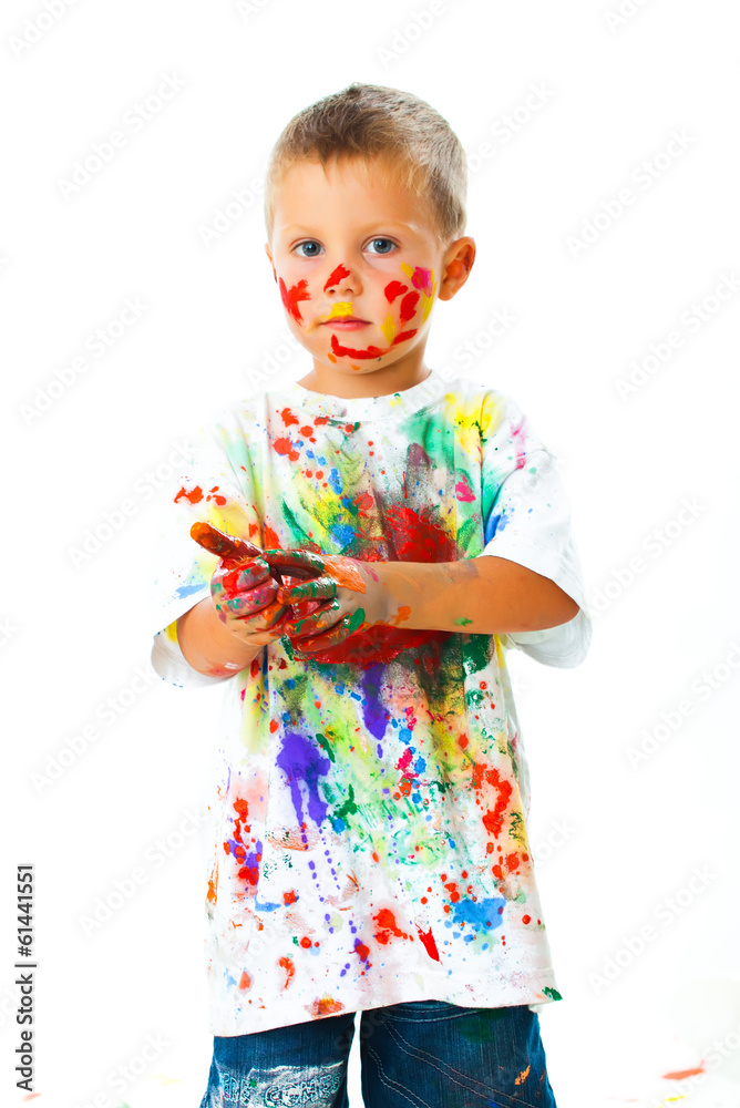 Smiling boy paints paints Smiling boy paints paints