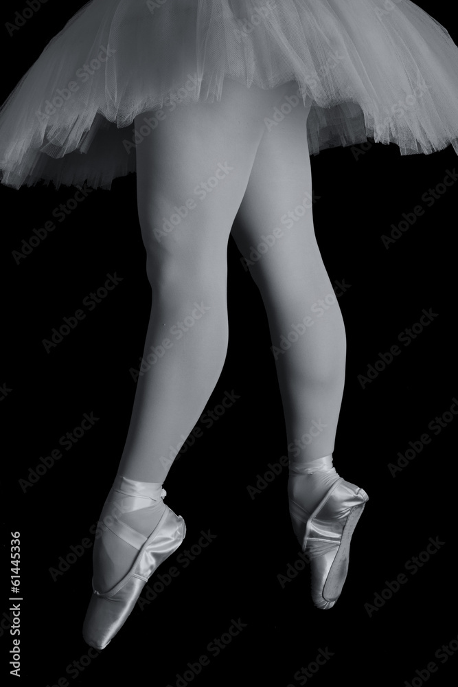 Ballet dancer standing on toes while dancing artistic converion Ballet dancer standing on toes while dancing artistic converion
