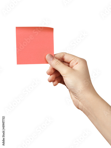 female teen hand holding red sticky note
