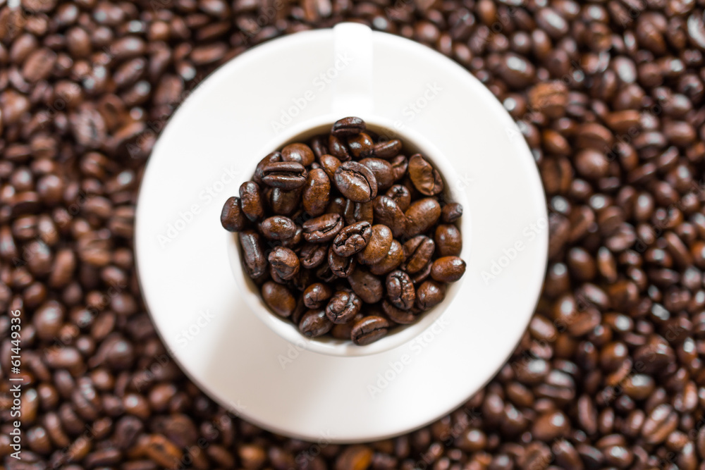 Close-up coffee mug, with coffee beans in it Close-up coffee mug, with coffee beans in it